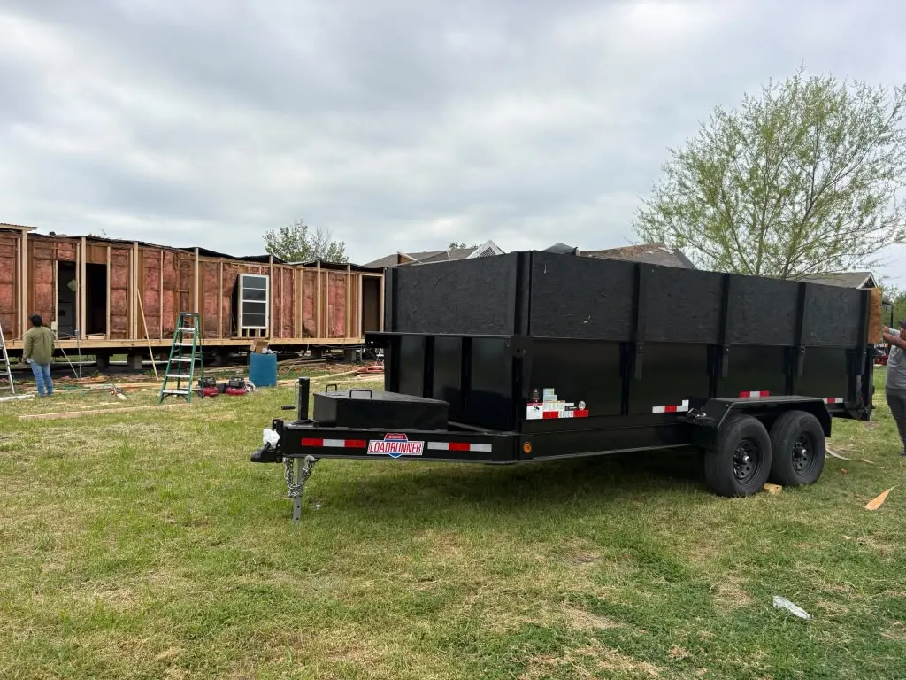 16-yard dumpster trailer on site at a home remodel